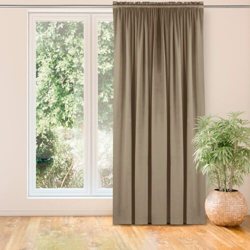VILA beige blackout curtain hanging in front of a window.