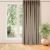 VILA beige blackout curtain in front of window