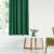 VILA glass green blackout curtain in a bright living room