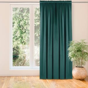 VILA teal blackout curtain hanging in front of a window - Interior design