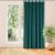 VILA teal blackout curtain hanging in front of a window