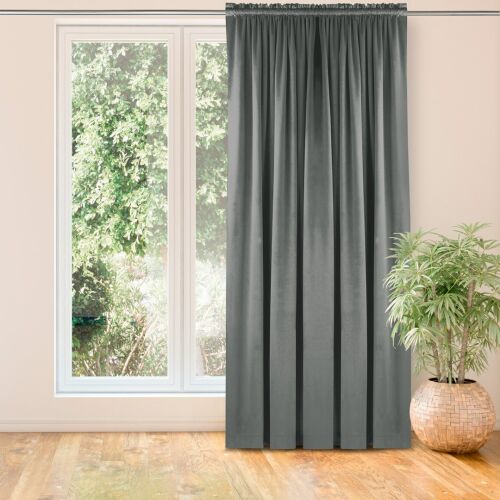 VILA graphite grey blackout curtain hanging in front of a window