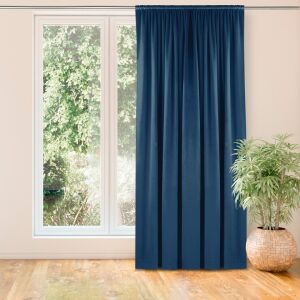 VILA indigo blue velvet blackout curtain hanging in a living room - Interior design