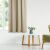 CARMENA beige blackout curtain in bright room