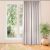 Carmena grey blackout curtain hanging in front of window