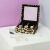 AmeliaHome GLASEN modern leopard print jewelry and watch organizer with compartments, open, showing watches