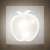 Apple shaped LED night light, warm white, plugged into a wall socket
