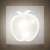 Apple shaped LED night light, warm white, plugged into a wall socket