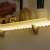 LED strip lighting a shelf, warm white