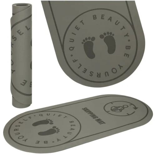 Graue Yoga- und Springmatte, gerollt und flach