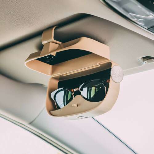 Car sunglasses holder and card organizer attached to sun visor, holding sunglasses
