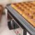 Close up of waffles cooking on Cecotec Fun Gofrestone waffle maker