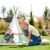 Kinderkraft Little Gardener teepee sátor és játszószőnyeg kerti környezetben