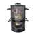 Pepita 5-in-1 charcoal BBQ grill and smoker set, showing the grill in use with meat and chicken