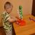 Child playing Shaking Wiggle Centipede game, using tweezers to pick up balls