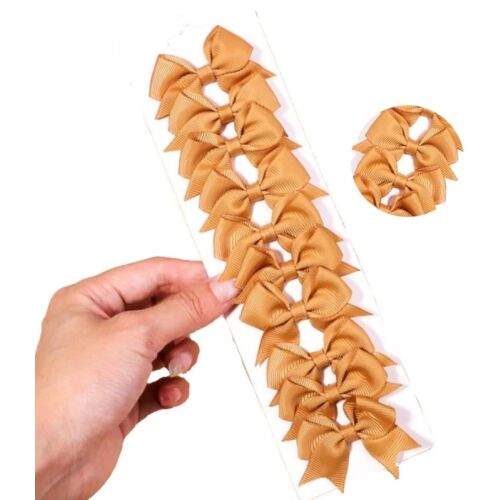 10 db-os, sárga masnival ellátott, kézzel készített, fém és szövet anyagú gyermekfogaskészlet