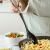 Using Nava Misty slotted spoon to serve pasta, nylon serving utensil