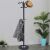 Springos black standing coat rack with marble base, hat and coat on hooks