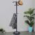 Springos black standing coat rack with marble base, hat and coat on hooks