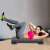 Woman using Springos adjustable step platform for fitness workout