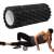 Woman using Springos 33 cm foam roller for muscle recovery