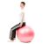 Woman sitting on pink fitness ball