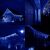 Collage of blue Icicle LED lights decorating houses