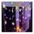 Springos star curtain lights, 136 LED, multicolor, hanging on a window, with a gnome decoration