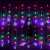 Springos star curtain lights, 136 LED, multicolor, hanging on a window, with a curtain