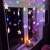 Springos star curtain lights, 136 LED, multicolor, hanging on a window, with a gnome decoration