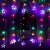 Springos star curtain lights, 136 LED, multicolor, hanging on a window, with a curtain