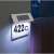 Solar powered house number sign with LED lights, stainless steel, 422C, illuminated at night