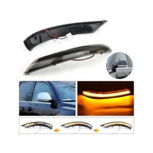 Zestaw 2 dynamicznych LED kierunkowskazów do lusterek bocznych dla VW Touareg 1 7L Facelift 2007-2011, pokazujący montaż i efekt świetlny - Pojazd i części