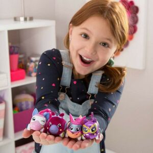 Ritzy Rollerz collectible animal cars being held by a smiling girl - Kids's play car