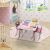 Zestaw stołu i krzeseł dla dzieci SUPER GIRL, różowy i biały, w pokoju dziecięcym