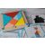Janod Tangram puzzle összeszerelve fa keretben mintakártyákkal.