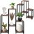 Springos Black and Brown Metal and Wood Plant Stand with Plants and Decorations