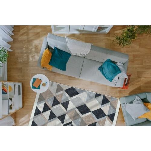 Bakero Kelim Arya beige und schwarzer Teppich im Wohnzimmer