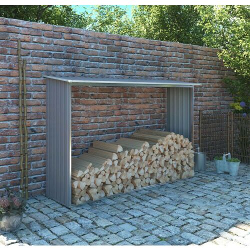 Rojaplast WC-B fém tűzifatároló fával töltve kerti környezetben