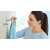 TESA Smooz chrome towel hook, single hook, drill-free, self-adhesive, for bathroom, hanging towel, woman using the hook