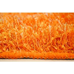 Közelkép a Bakero Shaggy Como narancssárga szőnyeg textúrájáról - Bakero