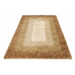 Schräge Ansicht des beigen Teppichs Bakero Shaggy Mali Dori 170x240 cm - Innenarchitektur