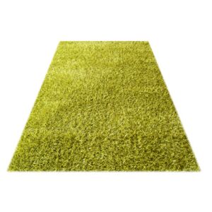 Dywan Bakero Shaggy Kota Kota w kolorze groszkowym (70x140 cm) na białym tle, widok pod kątem - Projektowanie wnętrz