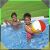 Child playing with beach ball in Bestway Steel Pro MAX pool