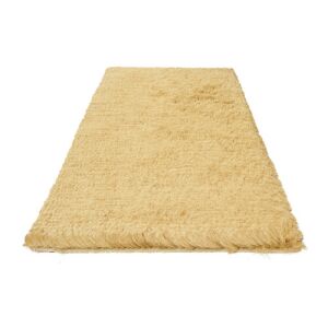 Bakero Shaggy Imola Gold Teppich 70x140 cm auf weißem Hintergrund - Innenarchitektur
