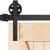 Springos black sliding door hardware installed on wooden door