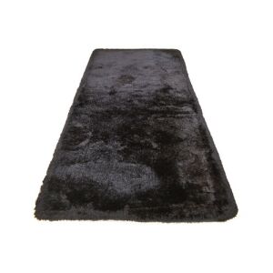 Schräge Ansicht des schwarzen Teppichs Bakero Shaggy Milano (70x140 cm) - Innenarchitektur