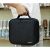 Soulima black cosmetic travel bag held by hand