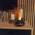 Ruhhy aroma diffuser humidifier with orange flame effect in a room setting