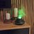 Ruhhy aroma diffuser humidifier in use with green flame effect in a room setting